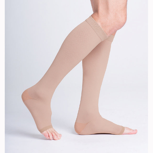 Image of Sigvaris Natural Rubber Knee High Stockings S4 Size, 40 to 50mm Hg Compression, Beige, Open Toe, Unisex, Latex